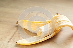 Banana on the wooden background. A banch of bananas over a wooden table