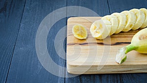 Banana on wooden board