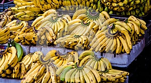 Bananas on a bench in a market