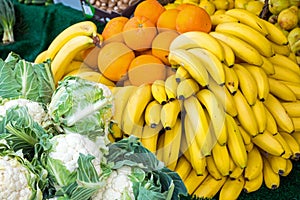 Bananas, oranges and cauliflower photo