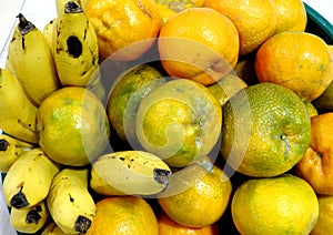 Bananas and  sweet oranges on the dining table