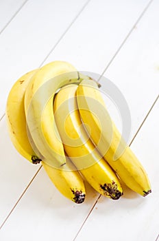 Bananas on a white table