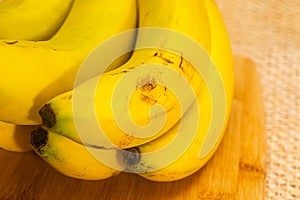 Bananas with yute texture in the background photo