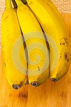 Bananas with yute texture in the background photo