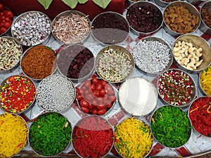 Banarasi paan , betel leaf , betel nut and all indian colorful banarasi ingredients for sale photo
