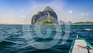 Banca Boat approaching Inabuyatan Island on Windy Day, El, Nido, Palawan, Philippines