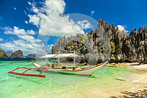 Banca boat at a beautiful beach in Miniloc Island,Philippines