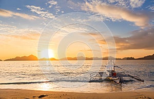 Banca boat at sunset in Palawan Island, Philippines