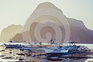 Bancas in front of Cadlao Island, El-Nido, Palawan, Philippines