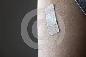 Band aid on an arm