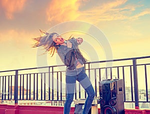 Band girl singing karaoke outdoor at roof terrace