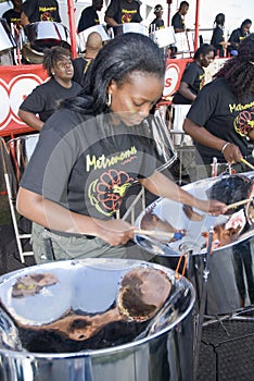 A band and member from Metronomes Steel Orchestra