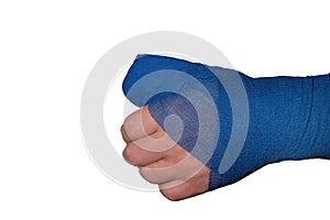 Bandaged hand isolated on white background.Broken arm. Blue surgical bandage on the arm.Fractures,sprains and Bandages