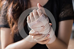 Bandaged hand in light and shadow