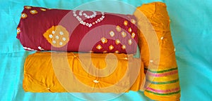 Bandhej dress material set. Bandhej which is also called Bandhani is widely used in Gujarat and Rajasthan.