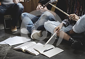 Bandmates rehearsing for their coming gig