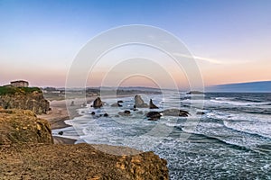 Bandon Beach landscape at dusk from Face Rock State Scenic Viewpoint, Pacific Coast, Oregon, USA