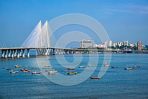 Bandra - Worli Sea Link bridge with fishing boats view from Bandra fort. Mumbai, India