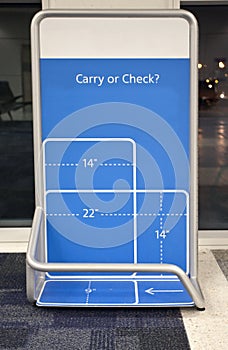 Airport metal cage for checking dimensions of carry on baggage