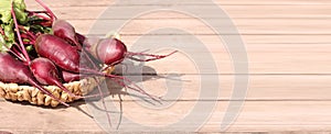 Baner fresh organic beetroot on rustic old background