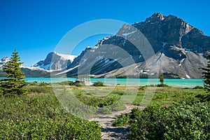 Banff National Park beautiful landscape. Bow Lake lakeshore trail and wooden bridge. Alberta, Canada.