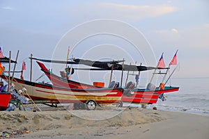 The Bangau Maritime Figureheads. Colorful pattern of traditional fisherman boats in Kelantan, Malaysia photo