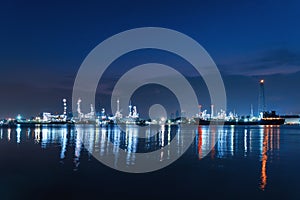Bangchak Petroleum`s oil refinery at night in industrial enginee