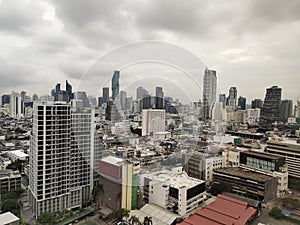 Bangkok, Thailand-October 2020 : Bang Rak area landscape cithy with rain cloudy. Day time. photo