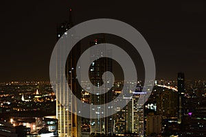 Bangkok and Chao Phraya River during the night. photo