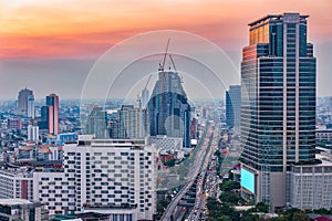 Bangkok city aerial view at twilight, business district with high building at dusk.