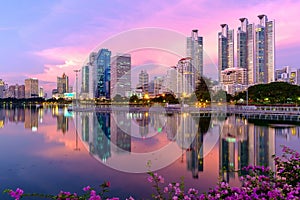 Bangkok city downtown at dusk with reflection of skyline