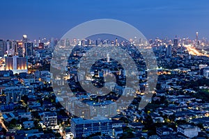 Bangkok city scrapers with high building at night time