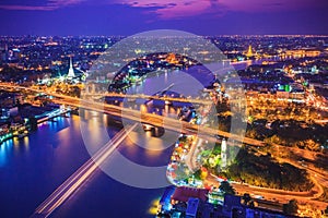 Bangkok city skyline and Chao Phraya River in twilight, Thailand