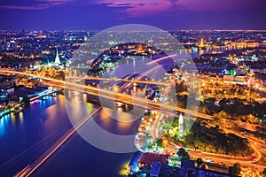 Bangkok city skyline and Chao Phraya River in twilight, Thailand