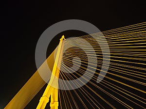 BANGKOK - High Resolution of Rama VIII Bridge Cable : Night scene of the Steel bridge pylon during the night in Bangkok, Thailand