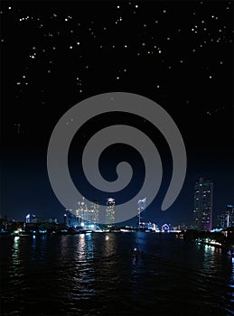 Bangkok night riverside with starry sky