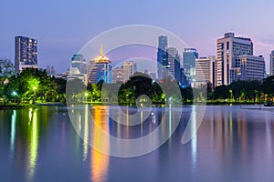 Bangkok skyline at dusk, Lumpini Park, Bangkok, Thailand