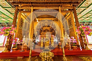 Bangkok, Thailand - December, 20, 2021 : Golden Wood Statue of Guan Yin with 1000 hands At Leng Noei Yi 2 or Mangkon Temple in