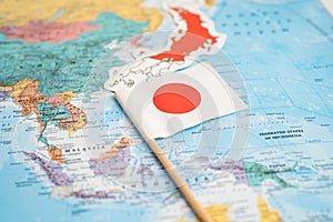 Bangkok, Thailand December 7, 2023, Japan flag on world map background