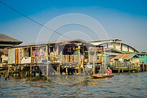 BANGKOK, THAILAND, FEBRUARY 08, 2018: Unidentified man in a boat, located at floating market