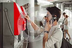 BANGKOK, THAILAND - JANUARY 22: A man make a call at station n