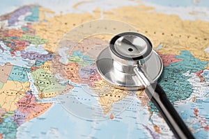 Bangkok, Thailand - June 1, 2020, Stethoscope on Asia world globe map background