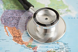 Bangkok, Thailand June 1, 2022, Stethoscope on United America world globe map background