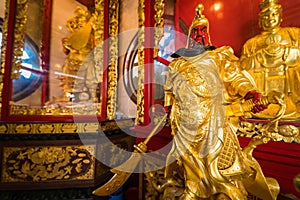 Bangkok, Thailand - March, 04, 2022 : Statue of the chinese god of wealth in Leng Noei Yi 2 or Mangkon Temple in Bangkok, Thailand