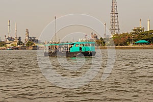 Bangkok, Thailand - March 14, 2017: People are crossing Chao Phraya river from Wat Bang Nam Pheung Nok via ferry service to Wat B