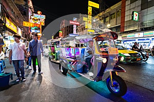 Bangkok, Thailand - March 2019: tuk-tuk taxi driver at China town night market