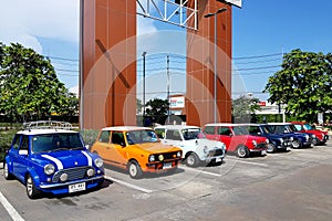 May 21, 2018: Many colorful mini Austin cooper parking on the street for showing old car festival