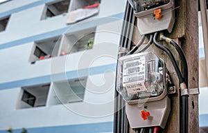 BANGKOK, THAILAND - MAY 22: Metropolitan Electric Authority electric meter number 7203117 operates hard on a hot day in Bangkok on