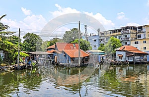 Bangkok,Thailand on May1,2020:Rural scene of old waterside houses along Khlong Bangkok YaiBangkok Yai Canal