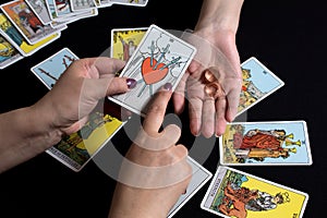 Bangkok,Thailand,november.17.19. Fortune telling with wedding rings, fortune telling on Christmas on love. Gypsy woman guessing at